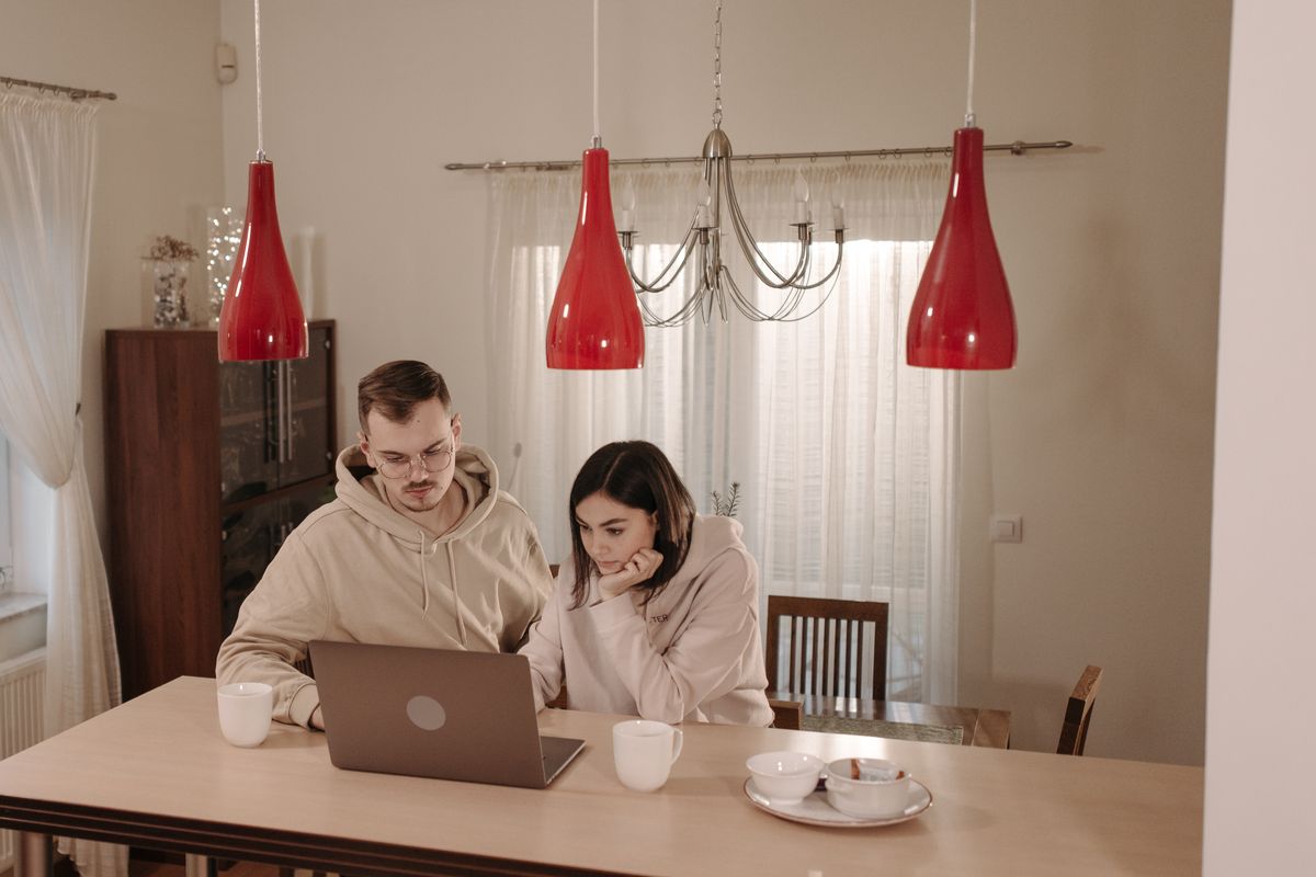 Colleagues working at a laptop